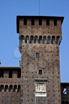 old tower castle brick   brown and window in the grass of castle sforzesco milan