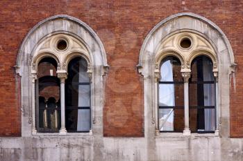 old castle brick   brown and window reflex in piazza dei mercanti milan