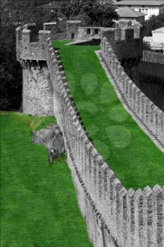 abstract castle brick and battlement in the grass of bellinzona switzerlan