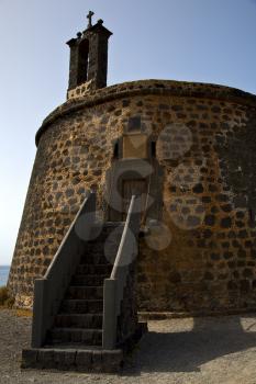 cross arrecife lanzarote castillo de las coloradas spain the old wall castle  tower and door  in teguise
