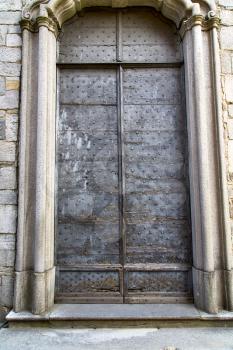  italy  lombardy     in  the arsago seprio    old   church   closed brick tower  wall grass