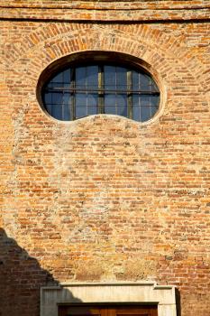 brown  europe  italy  lombardy        in  the milano old   window closed brick      abstract grate    