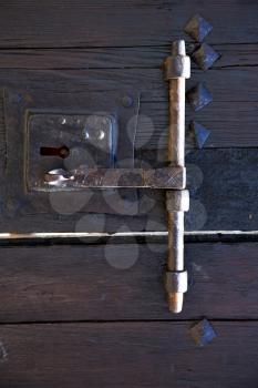 knocker spain castle lock  lanzarote abstract door wood in the red brown 
