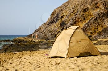 tent coast lanzarote  in spain musk pond beach  water yacht boat  and summer 
