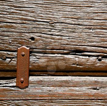 door in italy old ancian wood and traditional  texture nail