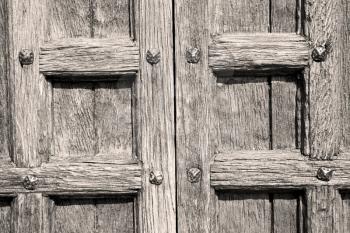 door in italy old ancian wood and trasditional  texture nail
