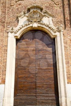 church  samarate  varese italy the old door entrance and mosaic