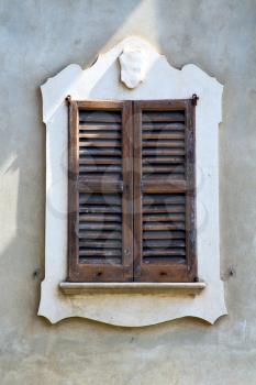 venegono varese italy abstract  window      wood venetian blind in the concrete  grey