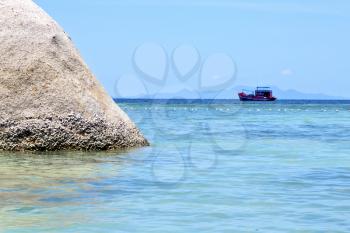 asia  kho tao  bay isle white  beach    rocks pirogue  in thailand and south china sea 