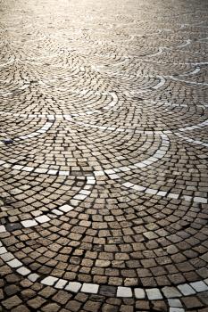 in the castano primo  street lombardy italy  varese abstract   pavement of a curch and marble
