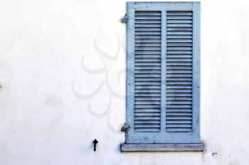 grey window  viladosia  palaces italy   abstract  sunny day    wood venetian blind in the concrete  brick  
