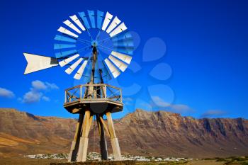 house africa wind turbines and the sky in  isle of lanzarote spain 
