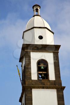  in teguise  arrecife lanzarote  spain the old wall terrace church bell tower plant
