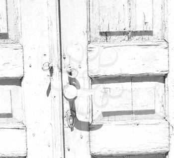 door  in italy old ancian wood and traditional               texture nail