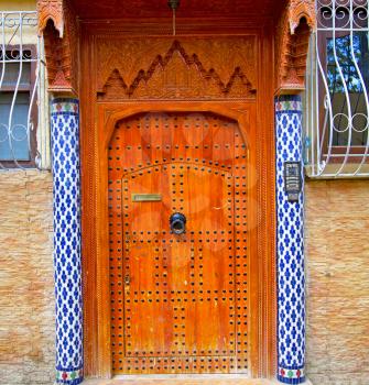 
historical in  antique building door morocco style africa   wood and metal rusty
