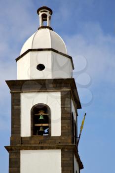  in teguise  arrecife lanzarote  spain the old wall terrace church bell tower plant
