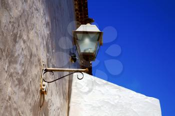 spain street lamp a bulb in the blue sky wall arrecife teguise lanzarote