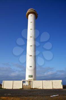 lanzarote lighthouse and rock in the blue sky   arrecife teguise spain
