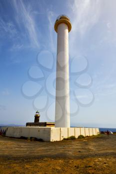 lanzarote lighthouse and rock in the blue sky   arrecife teguise spain

