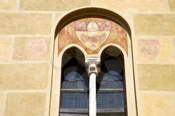 tradate varese italy abstract  window monument curch mosaic in the yellow 