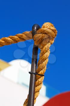 rope    and metal in the blue skay aocean mediterranean sea