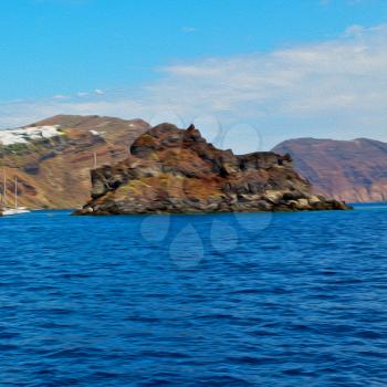 from    boat   in europe greece santorini island house and rocks the sky
