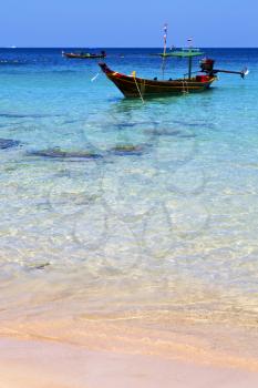 asia in the  kho tao bay isle white  beach    rocks house boat in thailand  and south china sea 
