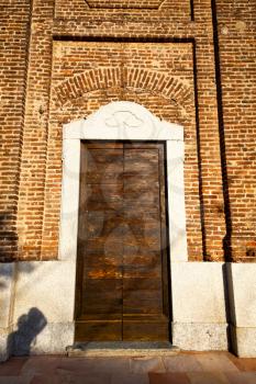 door italy  lombardy     in  the milano old   church   closed brick    pavement