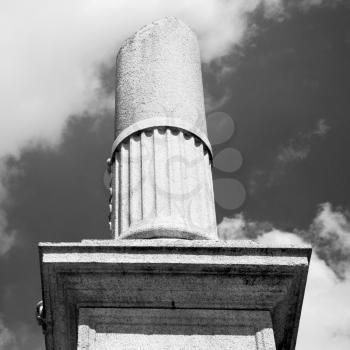 old column in the cloudy sky of europe italy