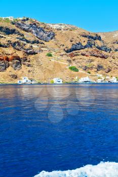 from    boat    in europe greece   santorini island house and rocks the sky