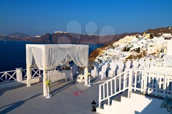 anniversary  and marriage cerimony in the sea of santorini greece island europe