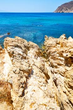 in greece the mykonos island rock sea and beach    sky