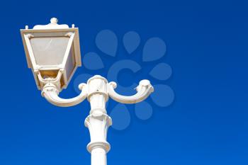  sky and abstract background in oman old streetlamp in the clear