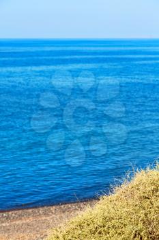 in      greece  the  mykonos island rock sea and beach    sky
