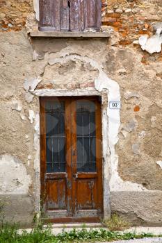 brown  europe  italy  lombardy        in  the milano old   window closed brick      abstract    door terrace