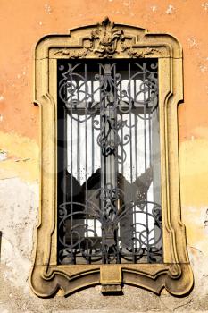shutter europe  italy  lombardy        in  the milano old   window closed brick      abstract grate
