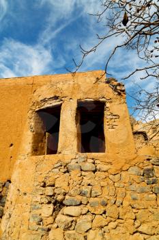 arch village     house and  cloudy sky in   oman the old abandoned 