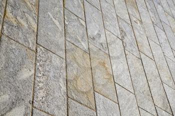 brick in the  casorate sempione street lombardy italy  varese abstract   pavement of a curch and marble

