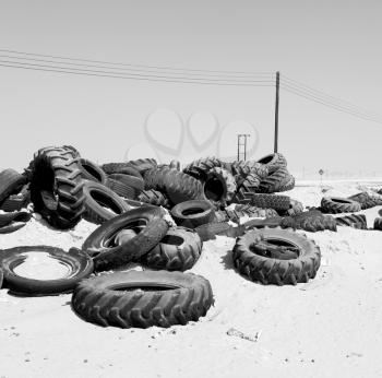 in oman old tires and desert  rubbish dump