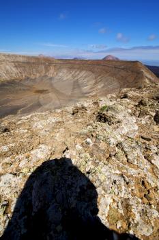 stone in los volcanes lanzarote  spain volcanic timanfaya  rock  sky  hill and summer 
