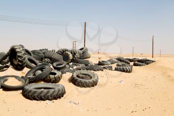 in oman old tires and desert  rubbish dump