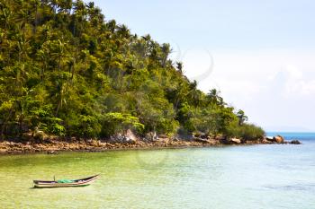 asia in the  kho koh phangan isle white  beach    rocks house boat   thailand  and south china  sea  