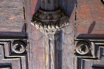  abstract  house door    in italy   lombardy   column  the milano old        closed nail rusty