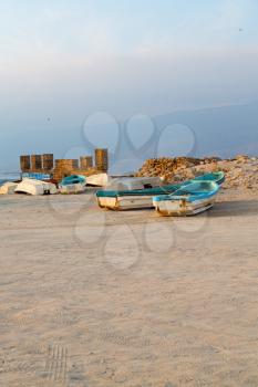 near sandy beach sky      and mountain in oman arabic sea  