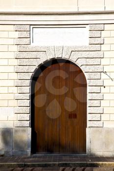 door italy  lombardy     in  the milano old   church   closed brick    pavement