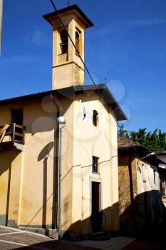 lombardy    in  the castiglione olona   old   church  closed brick tower sidewalk italy 
