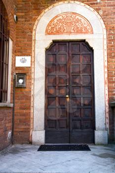 door italy  lombardy     in  the milano old   church   closed brick     pavement