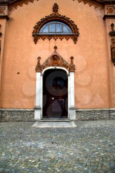  italy  lombardy     in  the azzate   old   church  closed brick tower      wall
