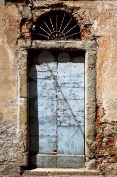 door italy  lombardy     in  the milano old   church   closed brick     pavement