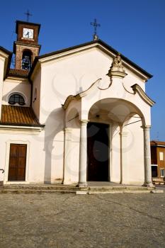 in  the mozzate   old   church  closed brick tower sidewalk italy  lombardy   